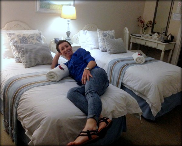 I know my mom will probably hate me for putting this up, but she is beautiful and it's her birthday on Saturday, so all my love to her, lying on some super comfy bed in a really neatly and perfectly finished B&B bedroom
